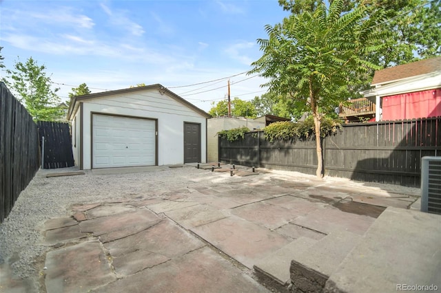 garage with central AC unit