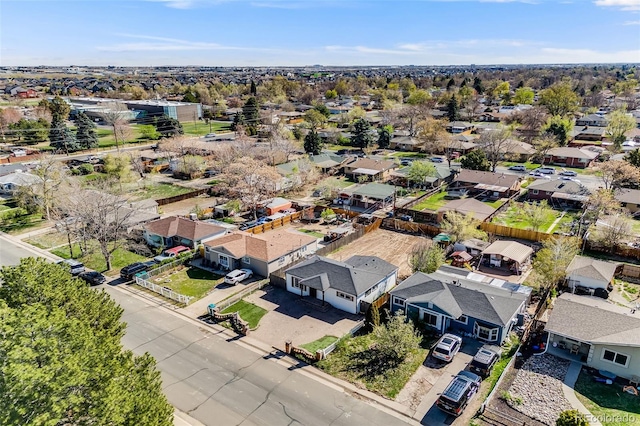 birds eye view of property with a residential view