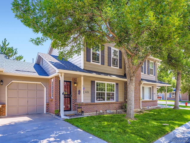 4121 W 111th Cir, Westminster, CO 80031 - view of front of property featuring brick siding, a front yard, concrete driveway, a garage, and a shingled roof