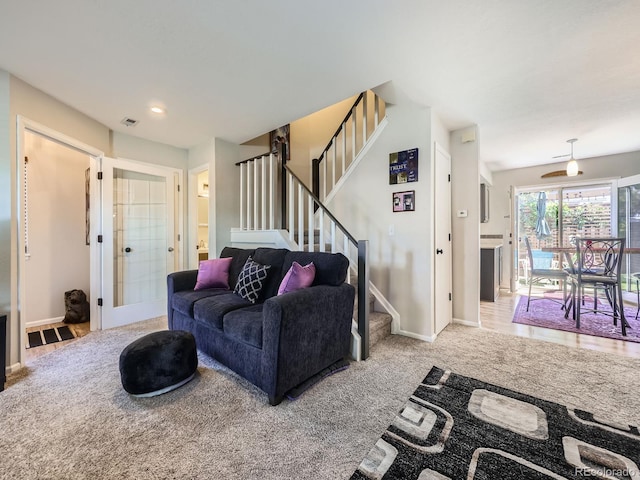 4121 W 111th Cir, Westminster, CO 80031 - carpeted living room with stairway and baseboards