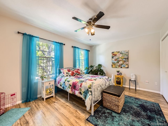 4121 W 111th Cir, Westminster, CO 80031 - bedroom featuring wood finished floors and ceiling fan