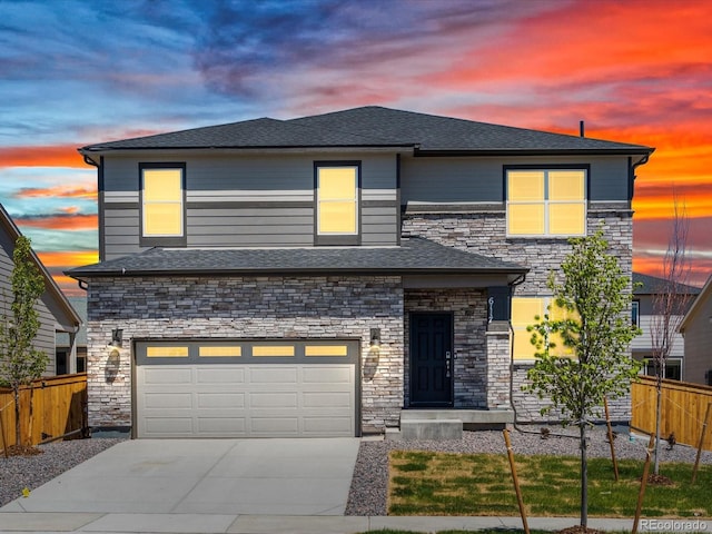 view of front of home with a garage