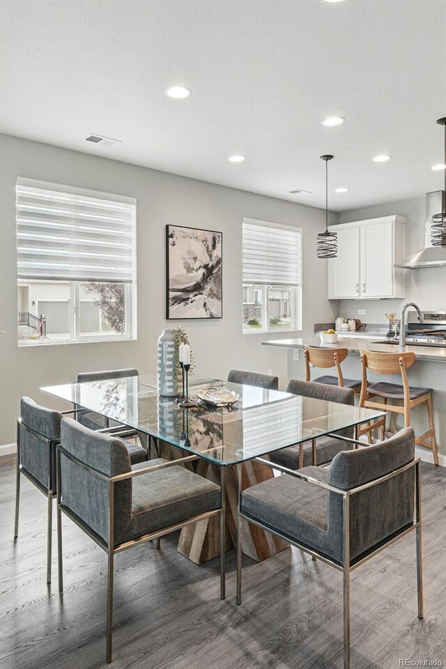 1592 Maggie Mae Ln, Castle Rock, CO 80104 - dining space with light wood-style floors, recessed lighting, and baseboards