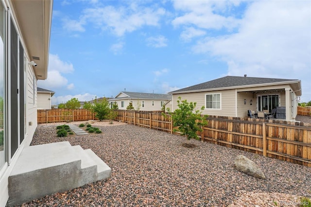 1592 Maggie Mae Ln, Castle Rock, CO 80104 - fenced backyard with a patio area