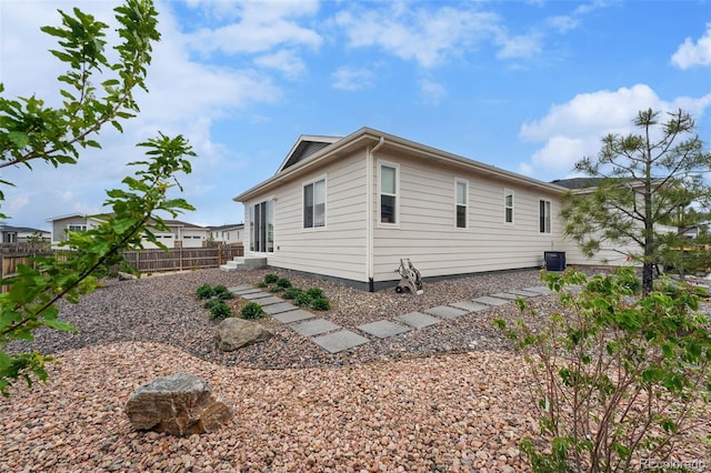 1592 Maggie Mae Ln, Castle Rock, CO 80104 - view of home's exterior with fence and central air condition unit