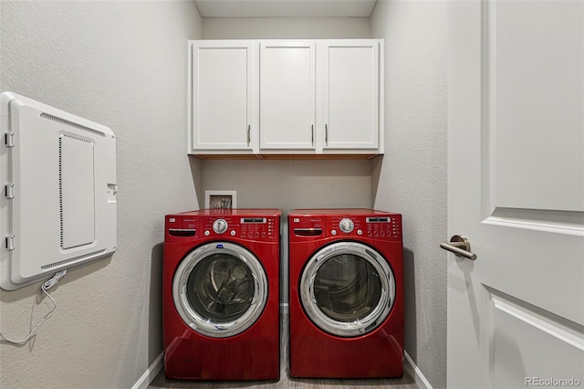 1592 Maggie Mae Ln, Castle Rock, CO 80104 - laundry area featuring independent washer and dryer, cabinet space, and baseboards