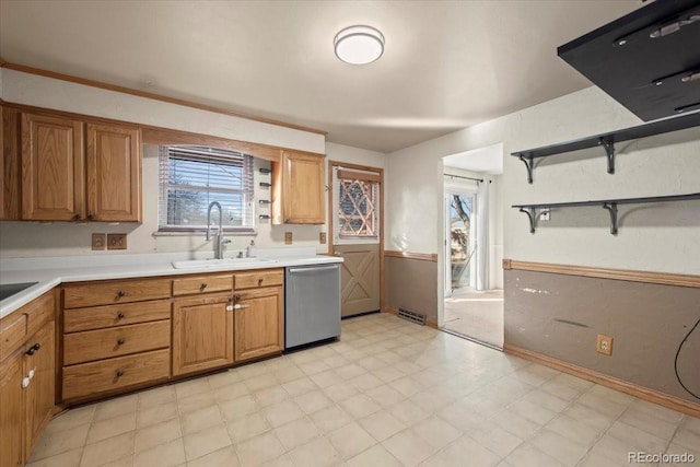 kitchen featuring stainless steel dishwasher and sink