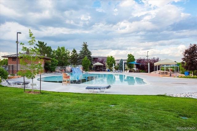 view of swimming pool featuring a gazebo, a patio area, and a lawn