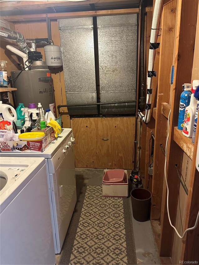 laundry area with separate washer and dryer and water heater