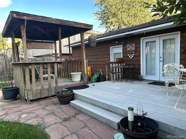 wooden deck featuring french doors