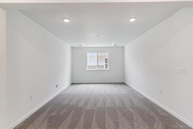 25254 E Warren Pl, Aurora, CO 80018 - carpeted spare room with baseboards and recessed lighting