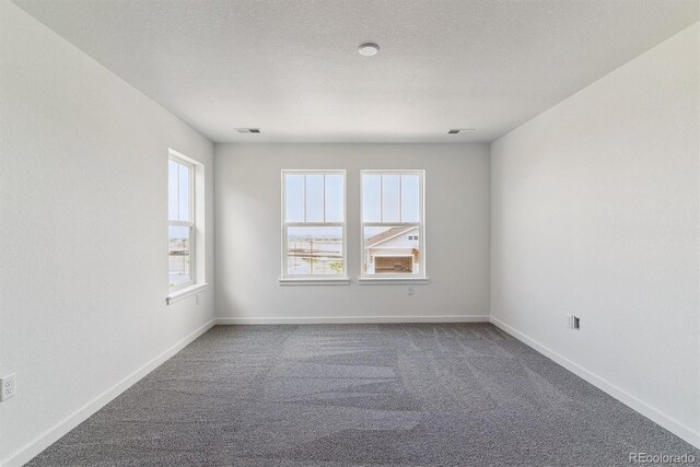 25254 E Warren Pl, Aurora, CO 80018 - carpeted empty room with baseboards