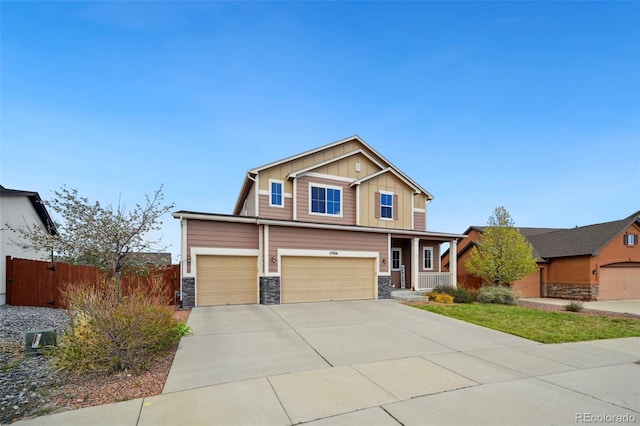 12766 Sunlight Peak Pl, Peyton, CO 80831 - craftsman inspired home with stone siding, board and batten siding, driveway, a garage, and an attached garage