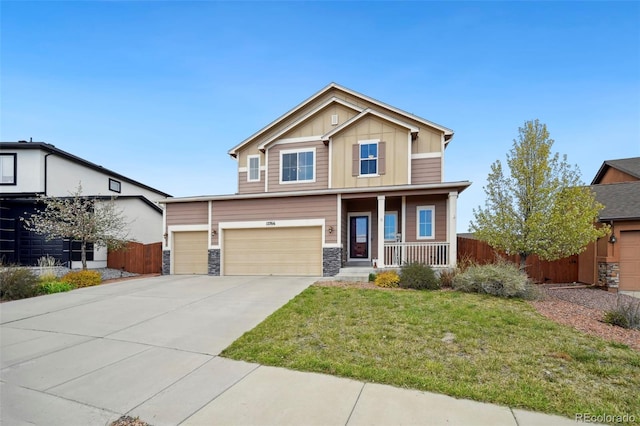 12766 Sunlight Peak Pl, Peyton, CO 80831 - craftsman-style house with board and batten siding, a porch, stone siding, concrete driveway, and a garage