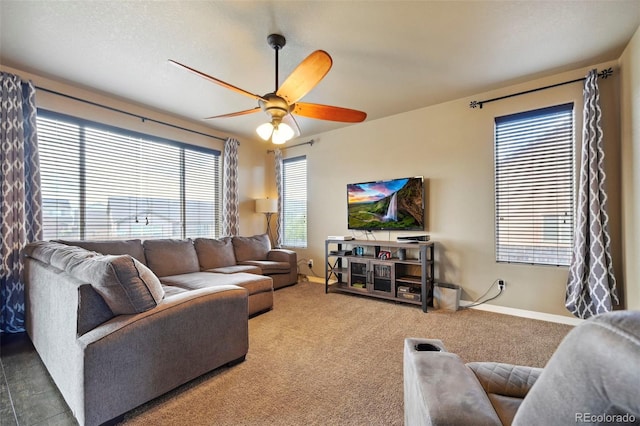 12766 Sunlight Peak Pl, Peyton, CO 80831 - carpeted living room featuring a ceiling fan and baseboards