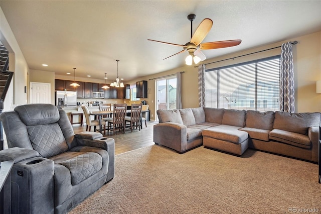 12766 Sunlight Peak Pl, Peyton, CO 80831 - living room with a ceiling fan, recessed lighting, and light wood-style floors