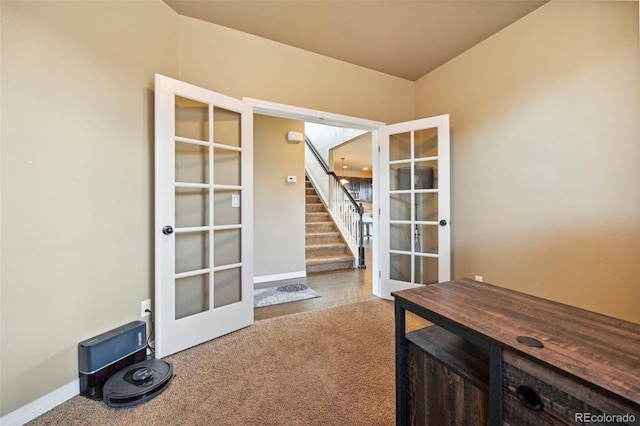 12766 Sunlight Peak Pl, Peyton, CO 80831 - doorway with french doors, carpet, stairs, and baseboards