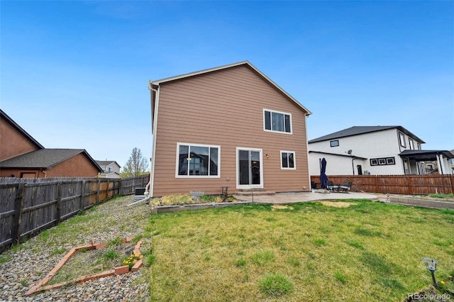 12766 Sunlight Peak Pl, Peyton, CO 80831 - back of property with a vegetable garden and a patio area