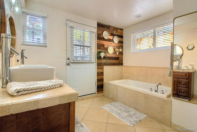 3835 Pecos St, Denver, CO 80211 - bathroom with a bath, healthy amount of natural light, tile patterned flooring, and a sink