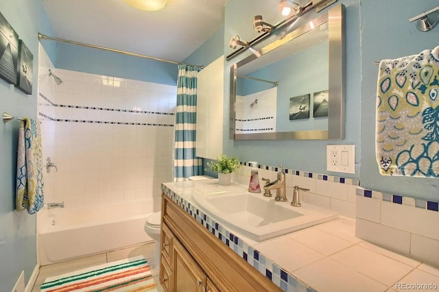 3835 Pecos St, Denver, CO 80211 - full bathroom featuring shower / tub combo, vanity, tile patterned flooring, and toilet