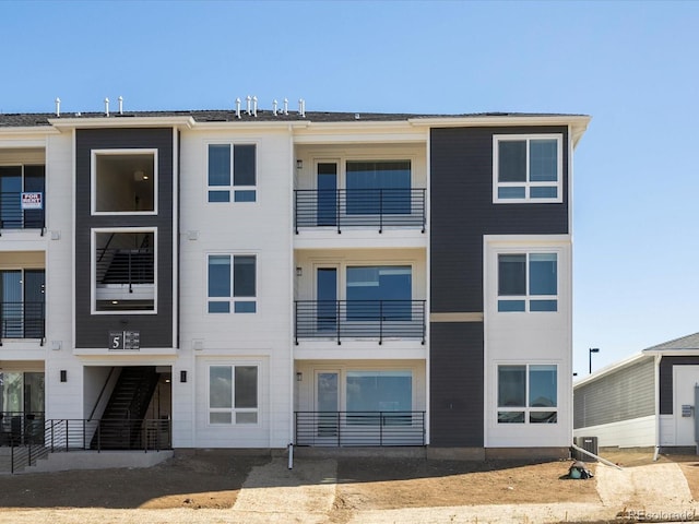 view of property with central AC unit