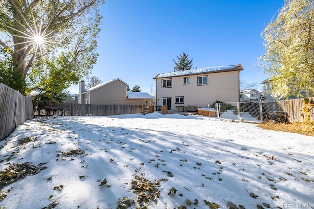 view of snow covered property