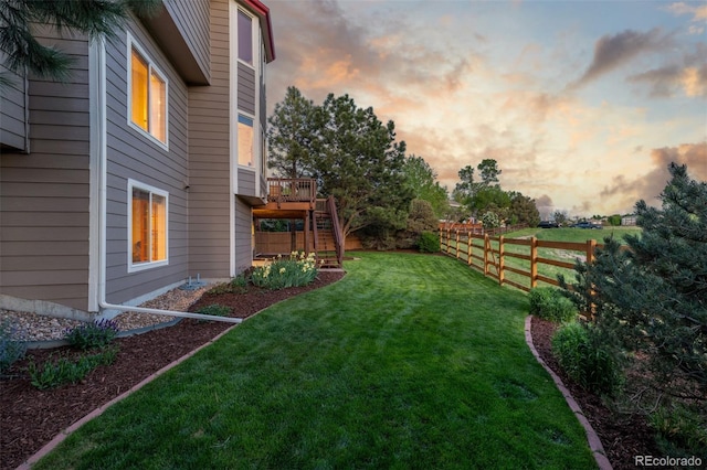 5048 Rocky Mountain Dr, Castle Rock, CO 80109 - yard at dusk with stairway and a wooden deck
