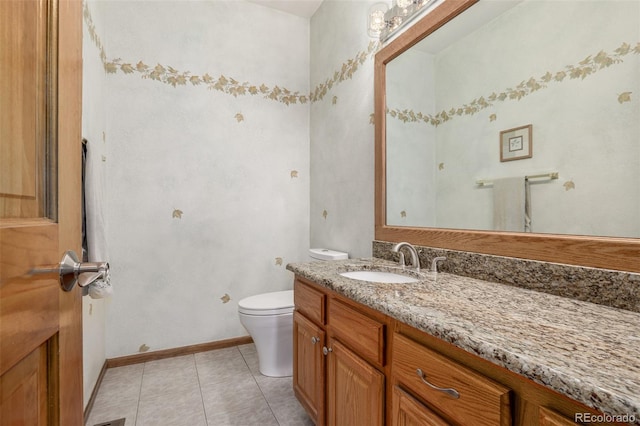 5048 Rocky Mountain Dr, Castle Rock, CO 80109 - bathroom with vanity, toilet, tile patterned floors, and baseboards
