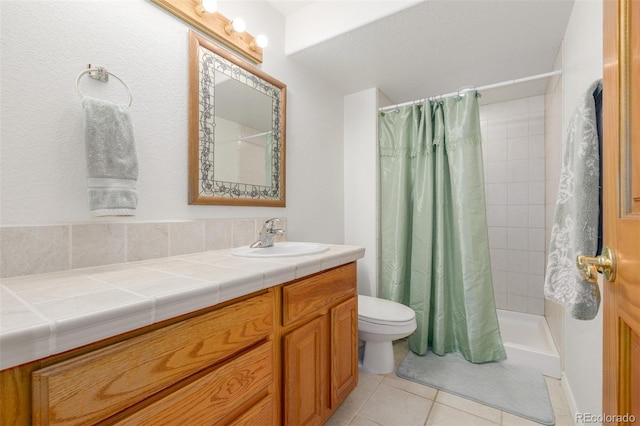 5048 Rocky Mountain Dr, Castle Rock, CO 80109 - bathroom featuring tile patterned flooring, toilet, vanity, and a shower with shower curtain
