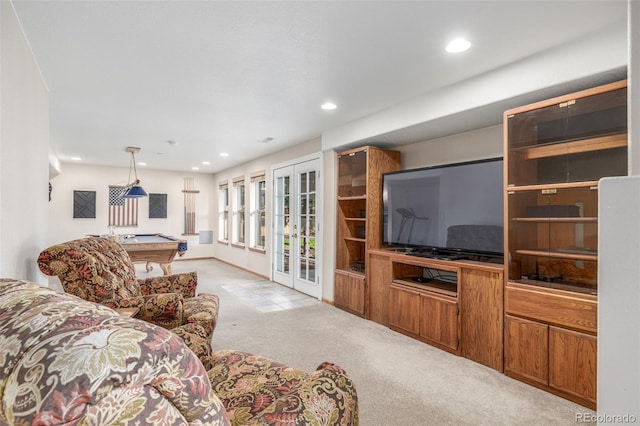 5048 Rocky Mountain Dr, Castle Rock, CO 80109 - living room with billiards, light carpet, french doors, and recessed lighting