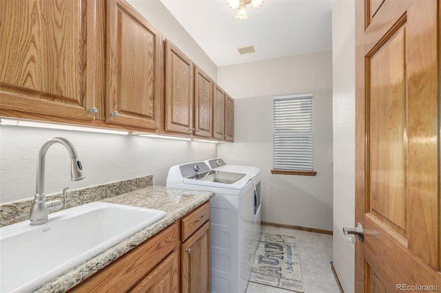 5048 Rocky Mountain Dr, Castle Rock, CO 80109 - laundry room featuring independent washer and dryer, cabinet space, and baseboards