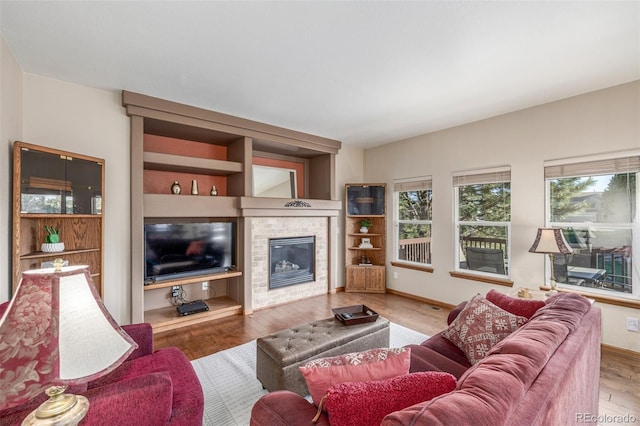 5048 Rocky Mountain Dr, Castle Rock, CO 80109 - living room with wood finished floors and a fireplace