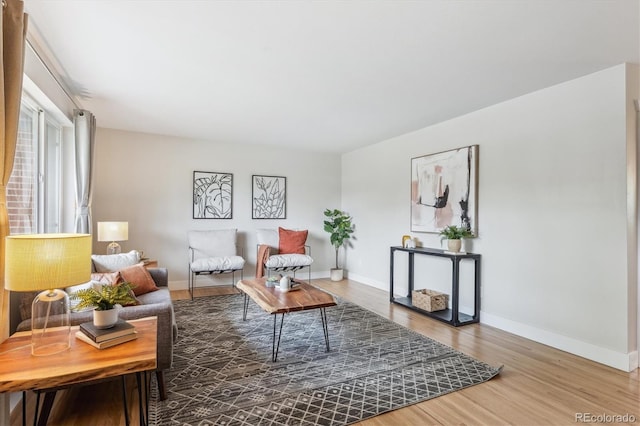 8490 E Davies Pl, Centennial, CO 80112 - living area with baseboards and wood finished floors