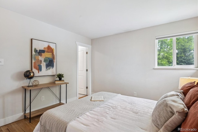 8490 E Davies Pl, Centennial, CO 80112 - bedroom with wood finished floors and baseboards