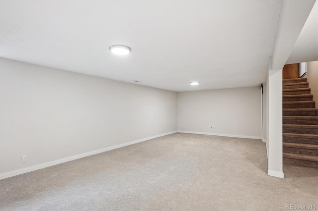 8490 E Davies Pl, Centennial, CO 80112 - finished below grade area with light colored carpet and stairway