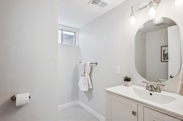 8490 E Davies Pl, Centennial, CO 80112 - bathroom featuring vanity and baseboards