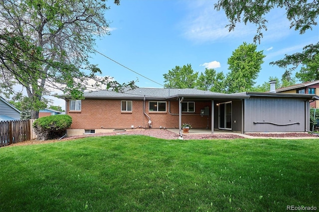 8490 E Davies Pl, Centennial, CO 80112 - back of house with a patio and brick siding