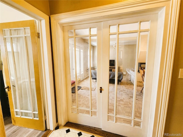 doorway to outside featuring french doors