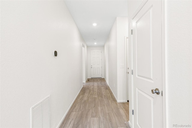 13342 E 110th Way, Commerce City, CO 80022 - hallway featuring light wood finished floors, baseboards, and recessed lighting