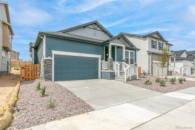 13342 E 110th Way, Commerce City, CO 80022 - craftsman-style house with an attached garage, concrete driveway, board and batten siding, and stone siding