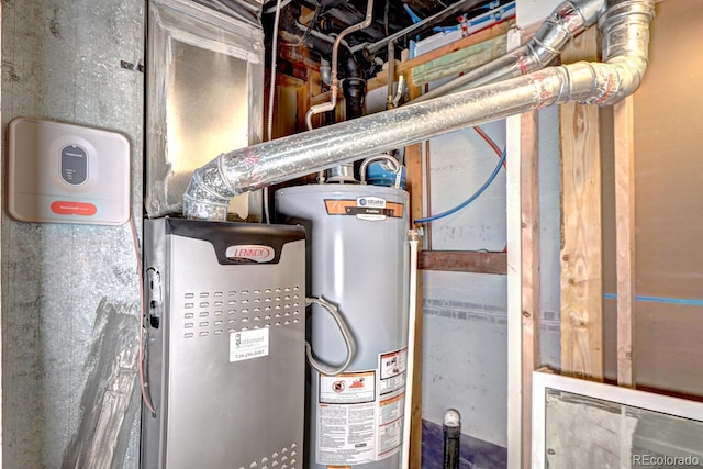 utility room featuring water heater