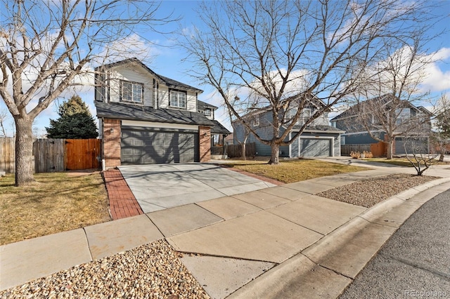 front facade featuring a front yard and a garage