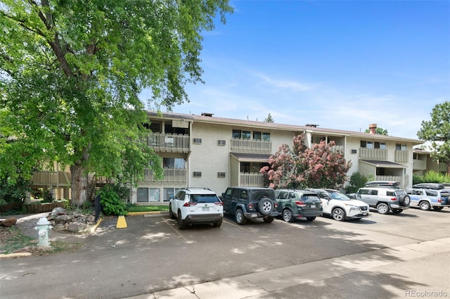 2707 Valmont Rd Unit 106, Boulder, CO 80304 - view of building exterior with uncovered parking