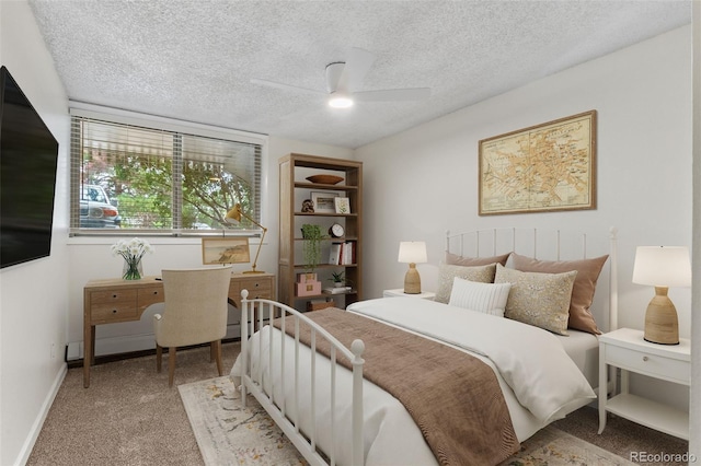 2707 Valmont Rd Unit 106, Boulder, CO 80304 - bedroom with carpet floors, a textured ceiling, and ceiling fan