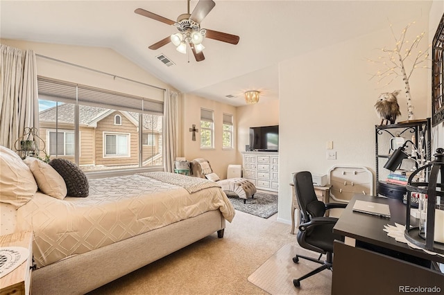 carpeted bedroom with lofted ceiling and ceiling fan