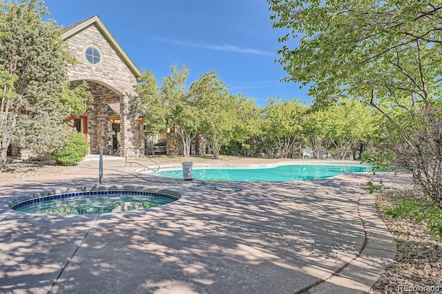 view of pool with a patio