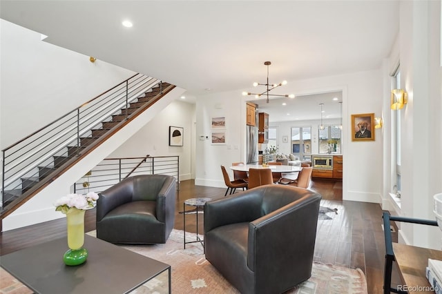 1511 S Pennsylvania St, Denver, CO 80210 - living area featuring stairway, recessed lighting, a chandelier, baseboards, and dark wood finished floors