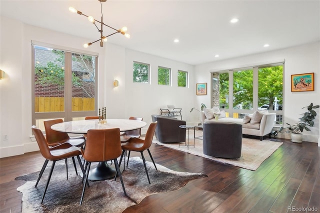 1511 S Pennsylvania St, Denver, CO 80210 - dining space featuring healthy amount of natural light, dark wood-style flooring, recessed lighting, and a chandelier