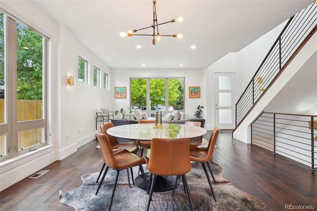 1511 S Pennsylvania St, Denver, CO 80210 - dining space featuring dark wood-type flooring, a chandelier, stairway, recessed lighting, and baseboards