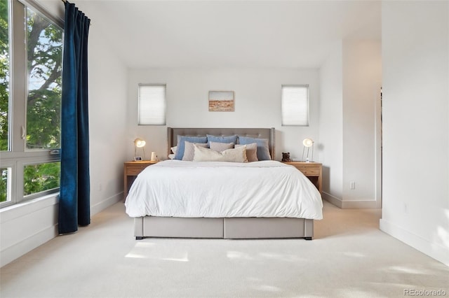 1511 S Pennsylvania St, Denver, CO 80210 - bedroom featuring carpet flooring, multiple windows, and baseboards